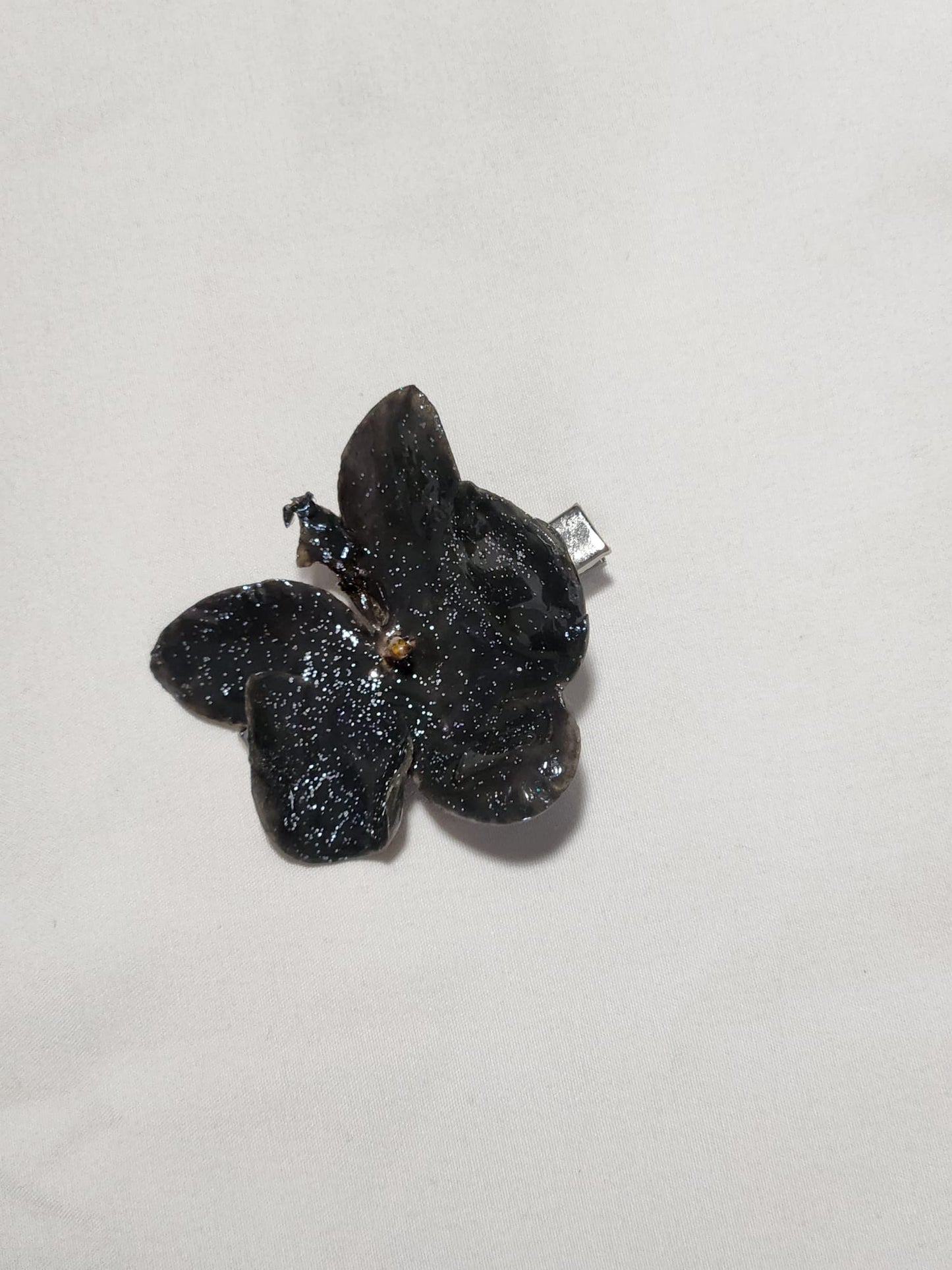 clip de orquídea negra